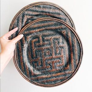 Two rattan plate chargers